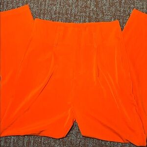 Women’s medium orange high waisted taper leg Italian pleated trousers cropped